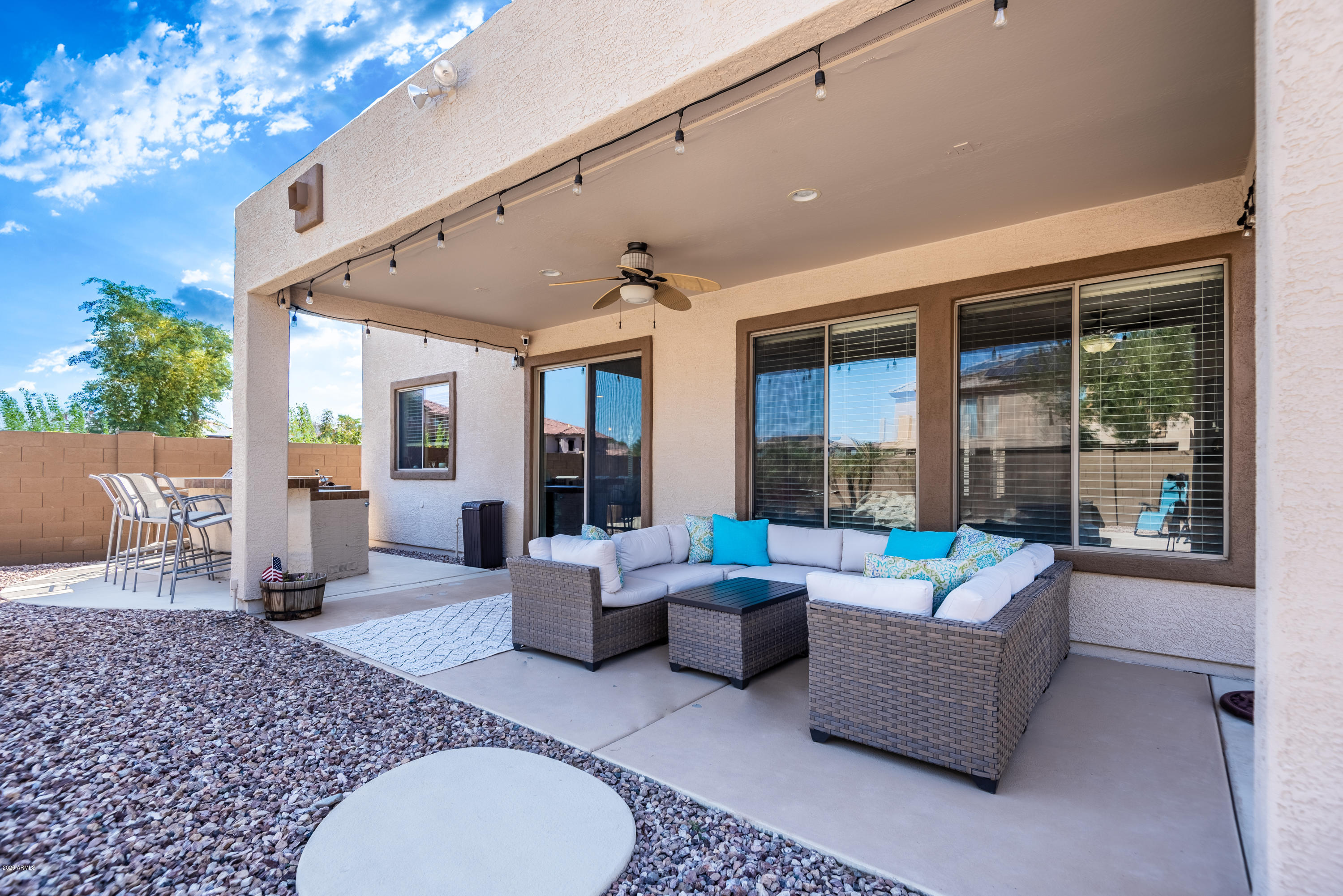 13628 West Calavar Road Surprise, AZ 85379 - Photo 42 of 48 a living room with furniture and a large window