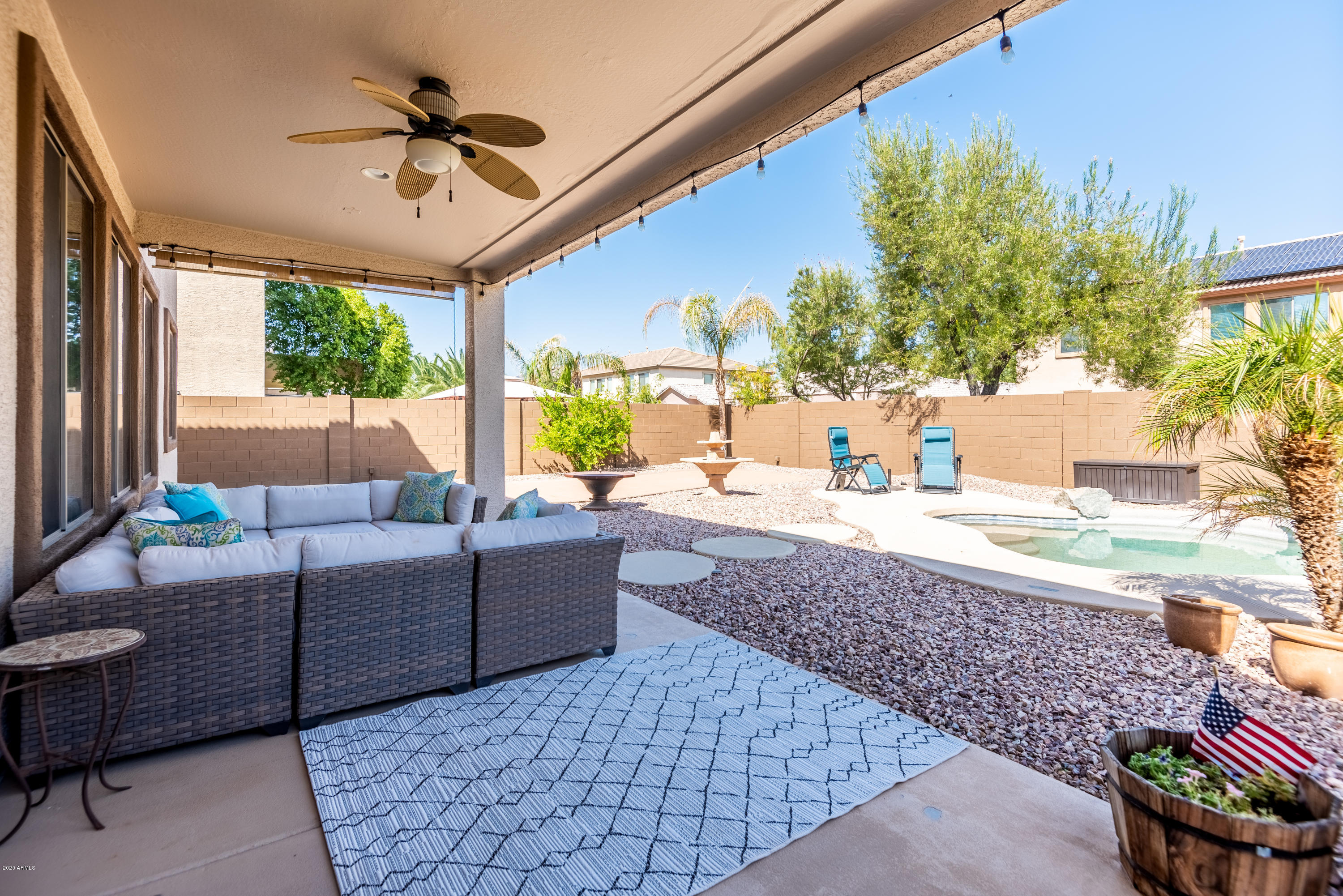 13628 West Calavar Road Surprise, AZ 85379 - Photo 44 of 48 a living room with furniture and a large window