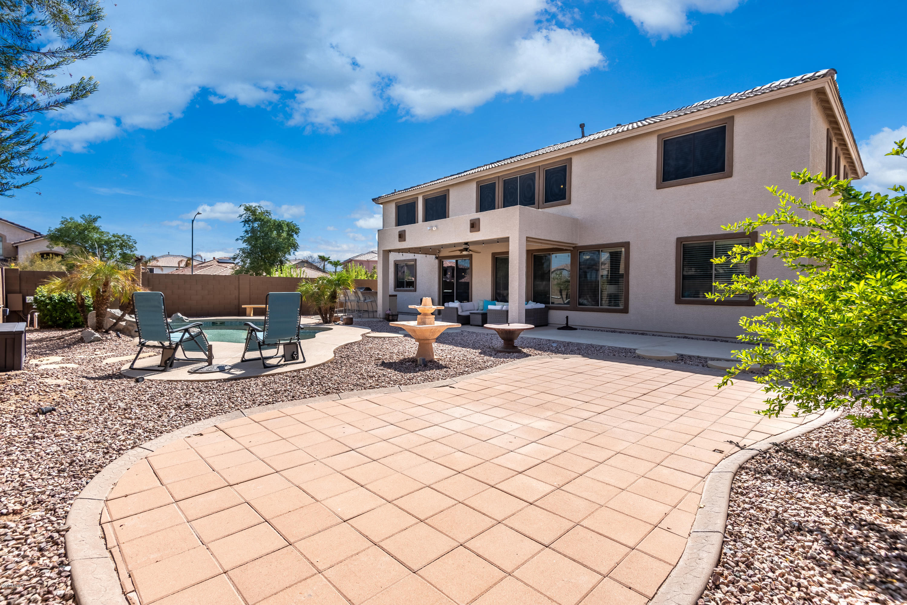 13628 West Calavar Road Surprise, AZ 85379 - Photo 47 of 48 a view of a building with cars park