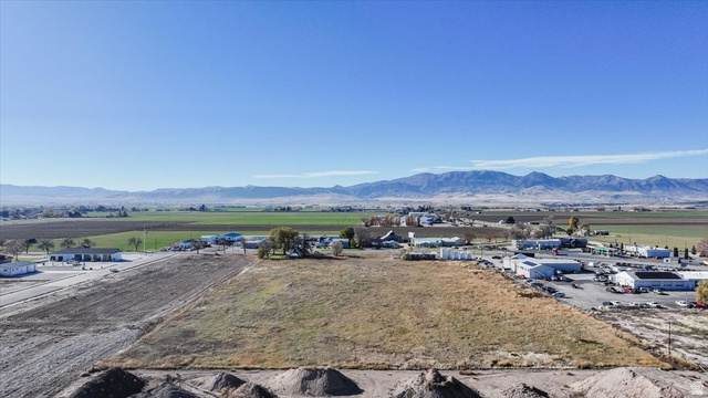 650 North State Street Preston, ID 83263 - Photo 9 of 14 View of mountain backdrop with an industrial area