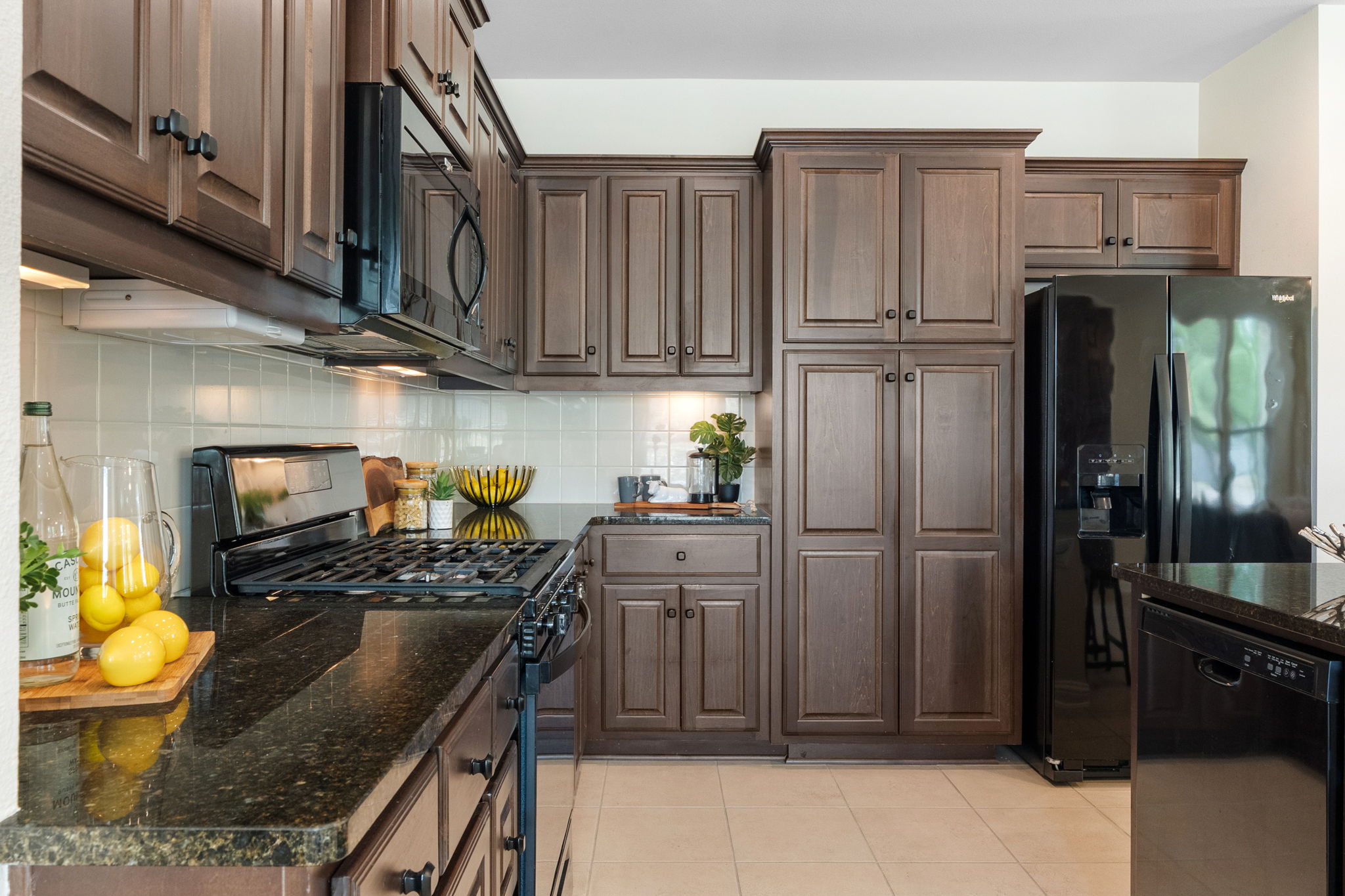 6814 East Riverside Drive, Unit 35 Austin, TX 78741 - Photo 10 of 31 The kitchen offers gas cooking, abundant cabinet storage, and comes complete with a refrigerator for move-in convenience ~