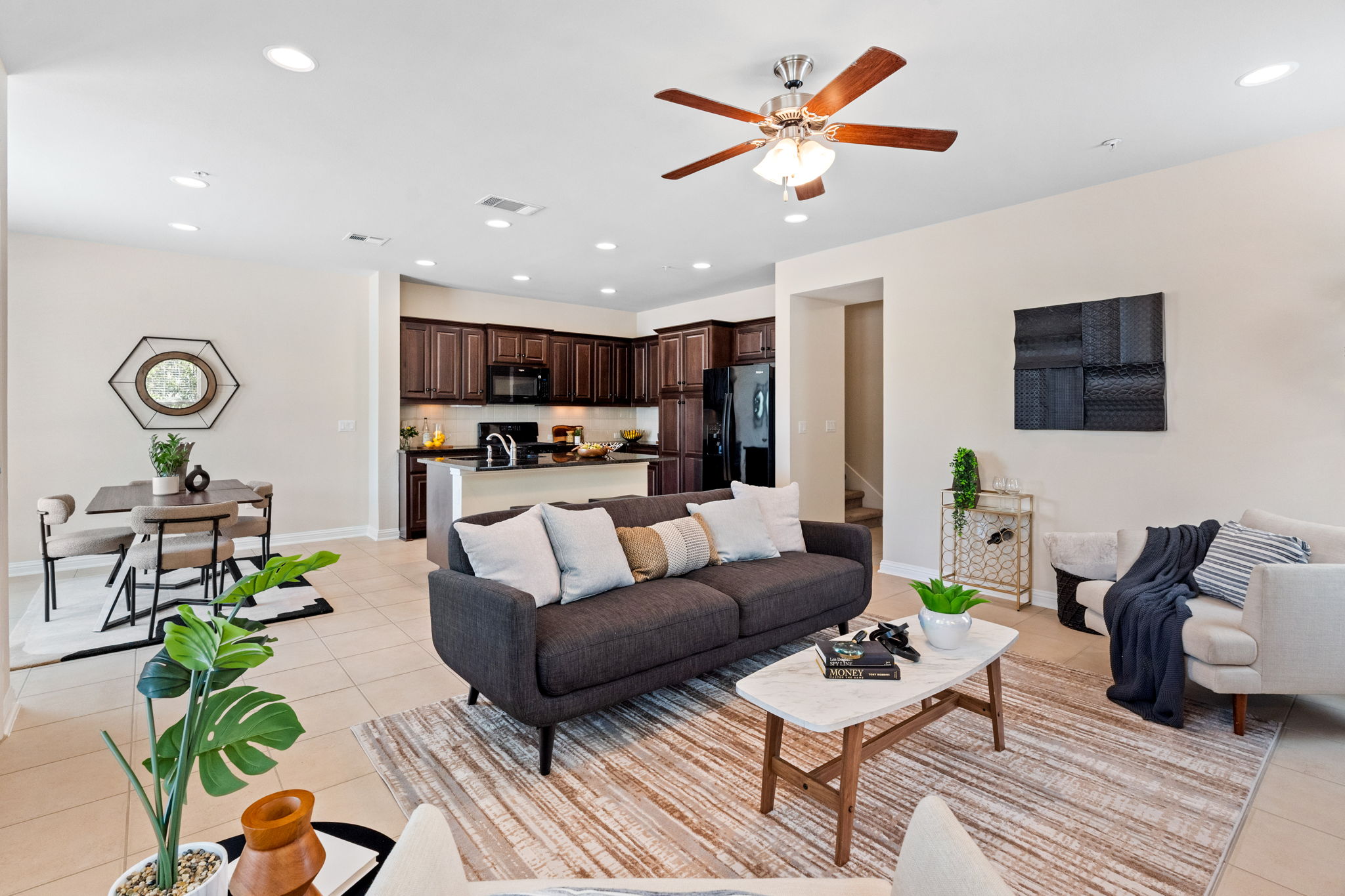 6814 East Riverside Drive, Unit 35 Austin, TX 78741 - Photo 31 of 31 a living room with furniture kitchen view and a chandelier