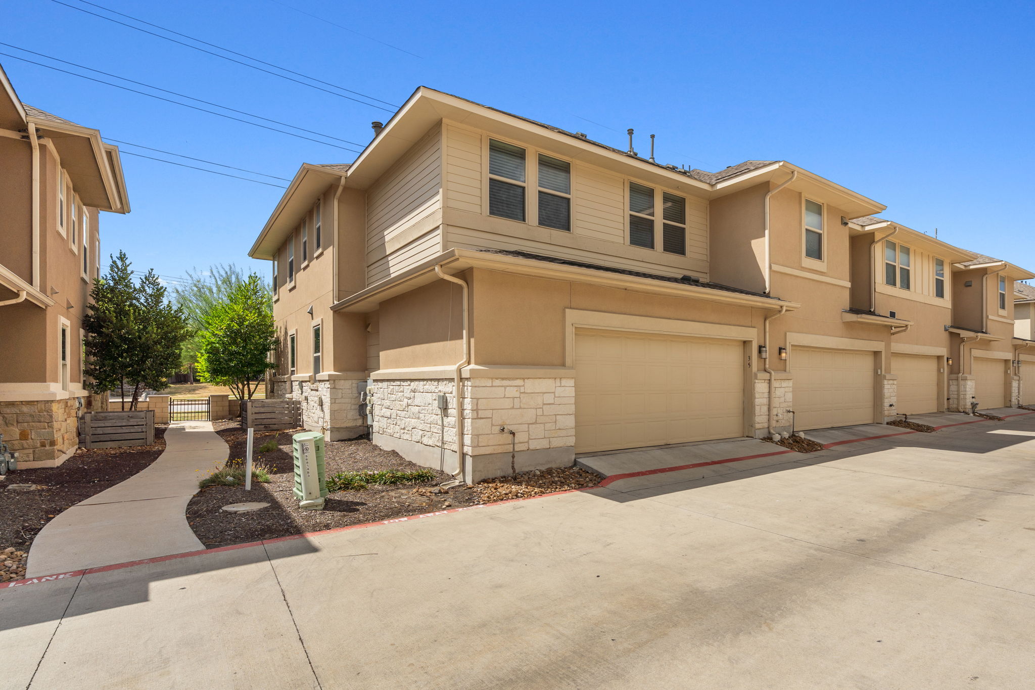 6814 East Riverside Drive, Unit 35 Austin, TX 78741 - Photo 25 of 31 Convenient two-car garage at the rear of property ~