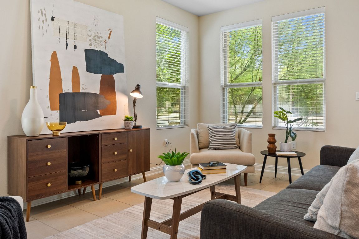 6814 East Riverside Drive, Unit 35 Austin, TX 78741 - Photo 2 of 31 a living room with furniture and a window