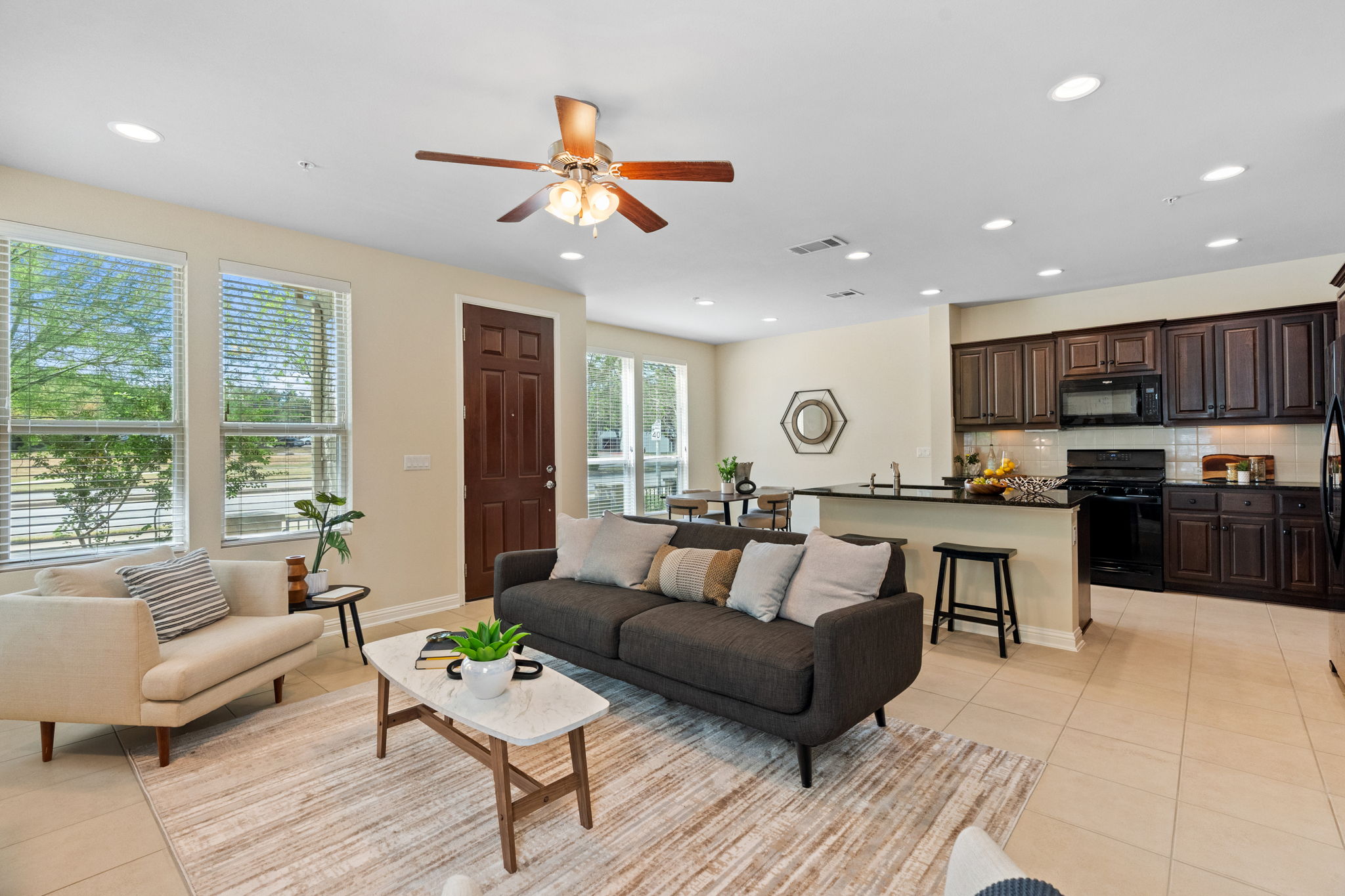 6814 East Riverside Drive, Unit 35 Austin, TX 78741 - Photo 4 of 31 a living room with furniture and kitchen view
