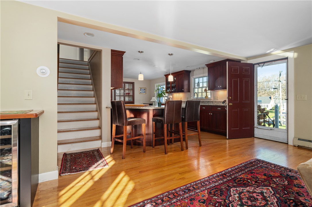 94 Abbott Run Valley Road Cumberland, RI 02864 - Photo 9 of 42 overhang granite counter with barstool area