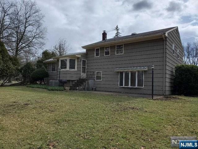 27 Ridge Road Cresskill, NJ 07626 - Photo 2 of 18 a view of a house with a yard