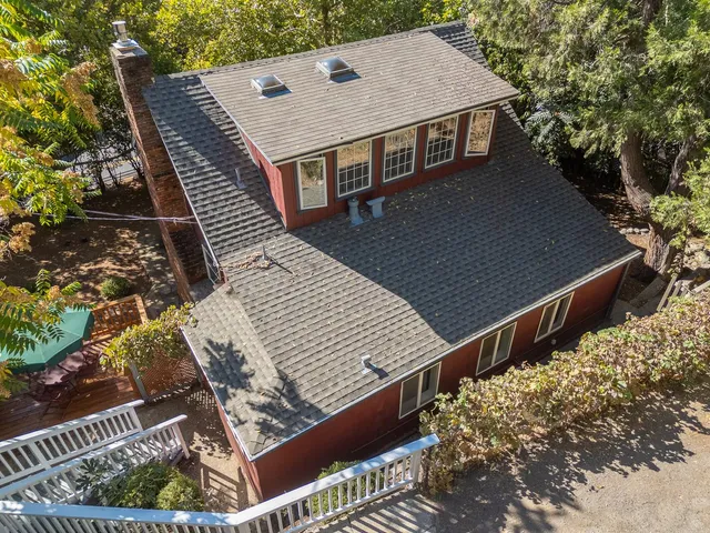a terrace with outdoor seating and wooden floor