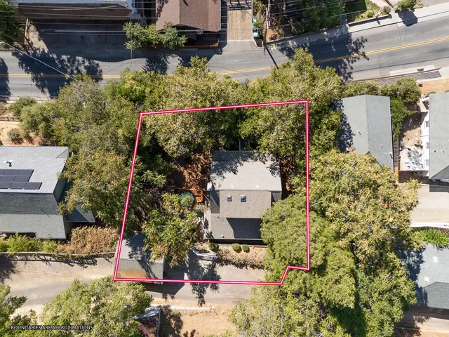a view of a house with a street