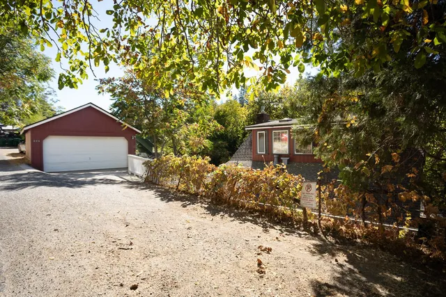 a view of a house with a small yard