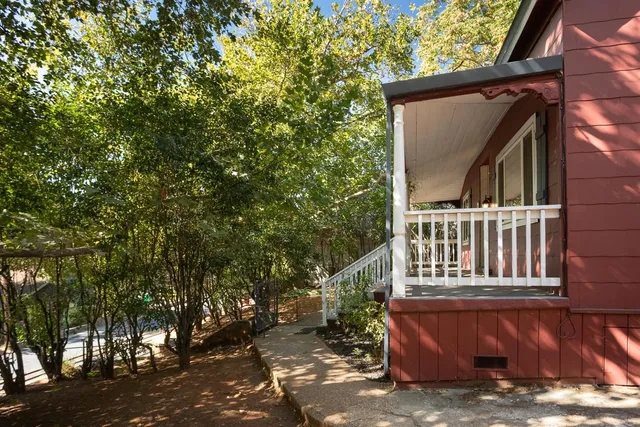 a backyard of a house with lots of green space