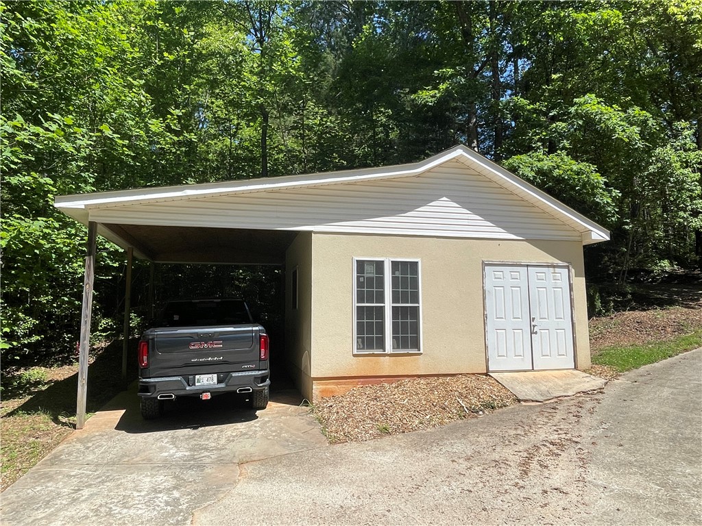 485 Mountain Rest Lake Road Mountain Rest, SC 29664 - Photo 39 of 45 Detached "recreational storage building" with single car carport