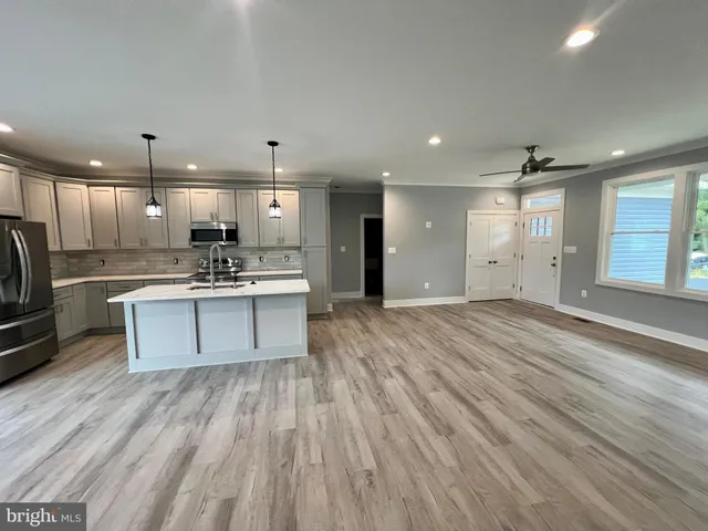 a view of kitchen and utility room