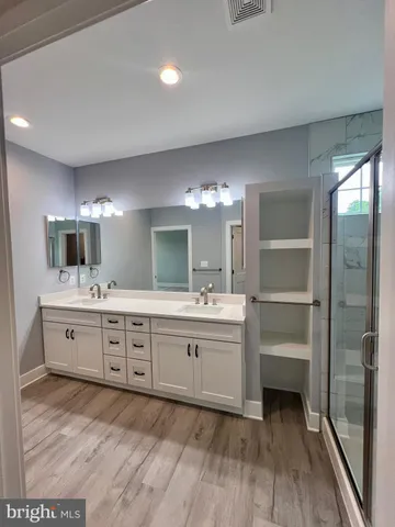a bathroom with a shower and toilet