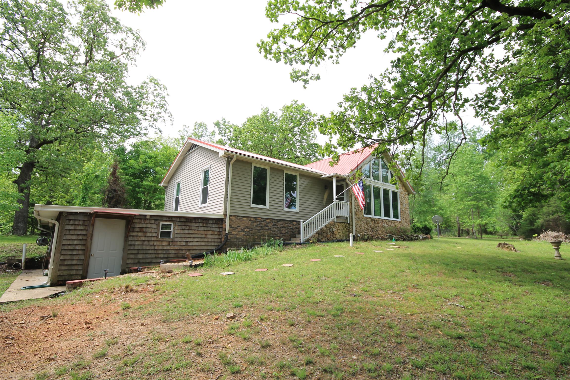 7184 Bahne Road Fairview, TN 37062 - Photo 2 of 14 a view of a house with a yard