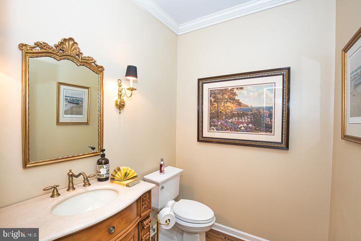 3589 Union Church Road Salisbury, MD 21804 - Photo 12 of 84 a bathroom with a toilet a sink and mirror