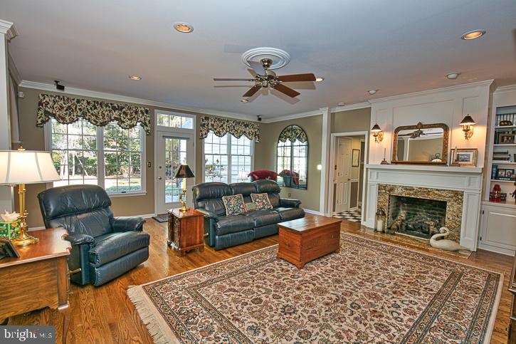 3589 Union Church Road Salisbury, MD 21804 - Photo 19 of 84 a living room with furniture and a fireplace