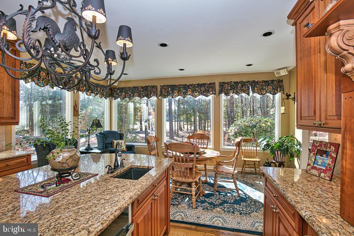 3589 Union Church Road Salisbury, MD 21804 - Photo 24 of 84 a very nice looking living room with a large window and a table