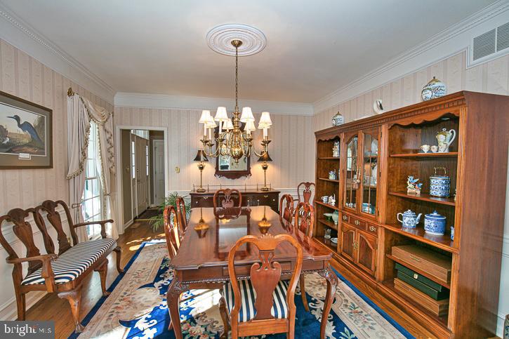3589 Union Church Road Salisbury, MD 21804 - Photo 29 of 84 a view of a dining room with furniture and chandelier