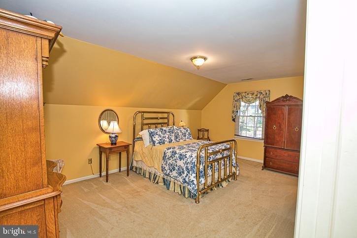 3589 Union Church Road Salisbury, MD 21804 - Photo 43 of 84 a bed room with a bed and a table