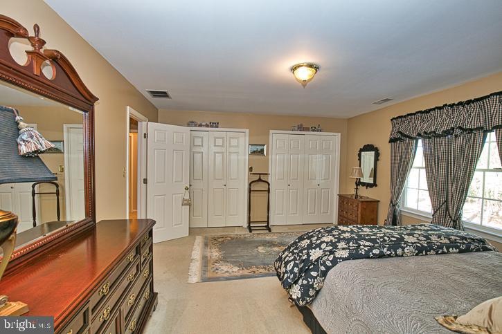 3589 Union Church Road Salisbury, MD 21804 - Photo 50 of 84 a bedroom with a bed and a dresser