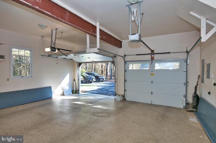 3589 Union Church Road Salisbury, MD 21804 - Photo 64 of 84 a view of a livingroom with wooden floor and a ceiling fan