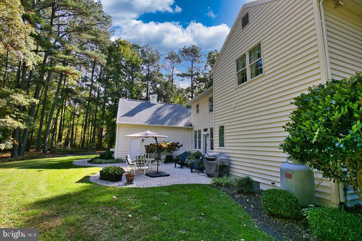 3589 Union Church Road Salisbury, MD 21804 - Photo 73 of 84 a view of a patio with couches chairs and a big yard