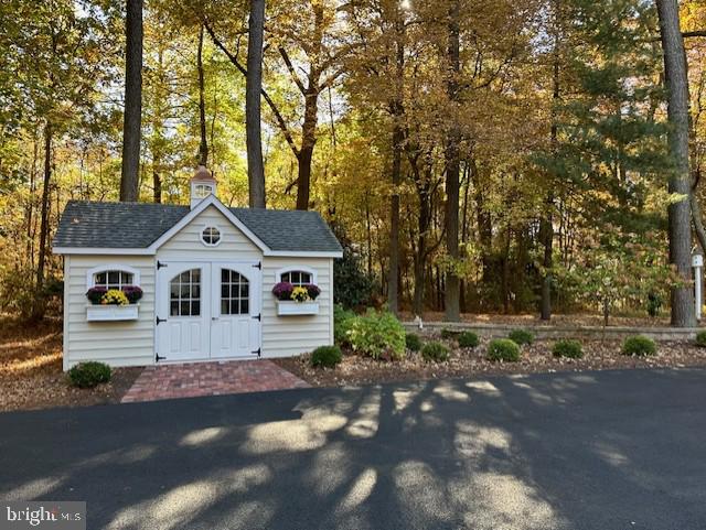 3589 Union Church Road Salisbury, MD 21804 - Photo 80 of 84 a front view of a house with a yard and garage