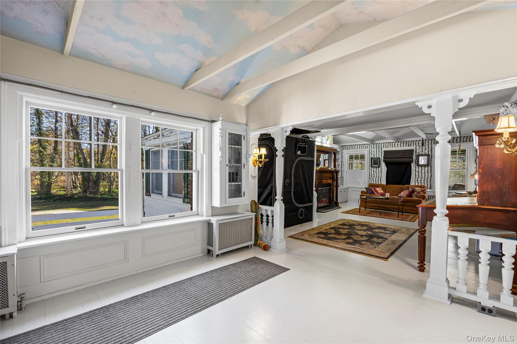 403 Middle Road Bayport, NY 11705 - Photo 17 of 48 a living room with furniture and a table