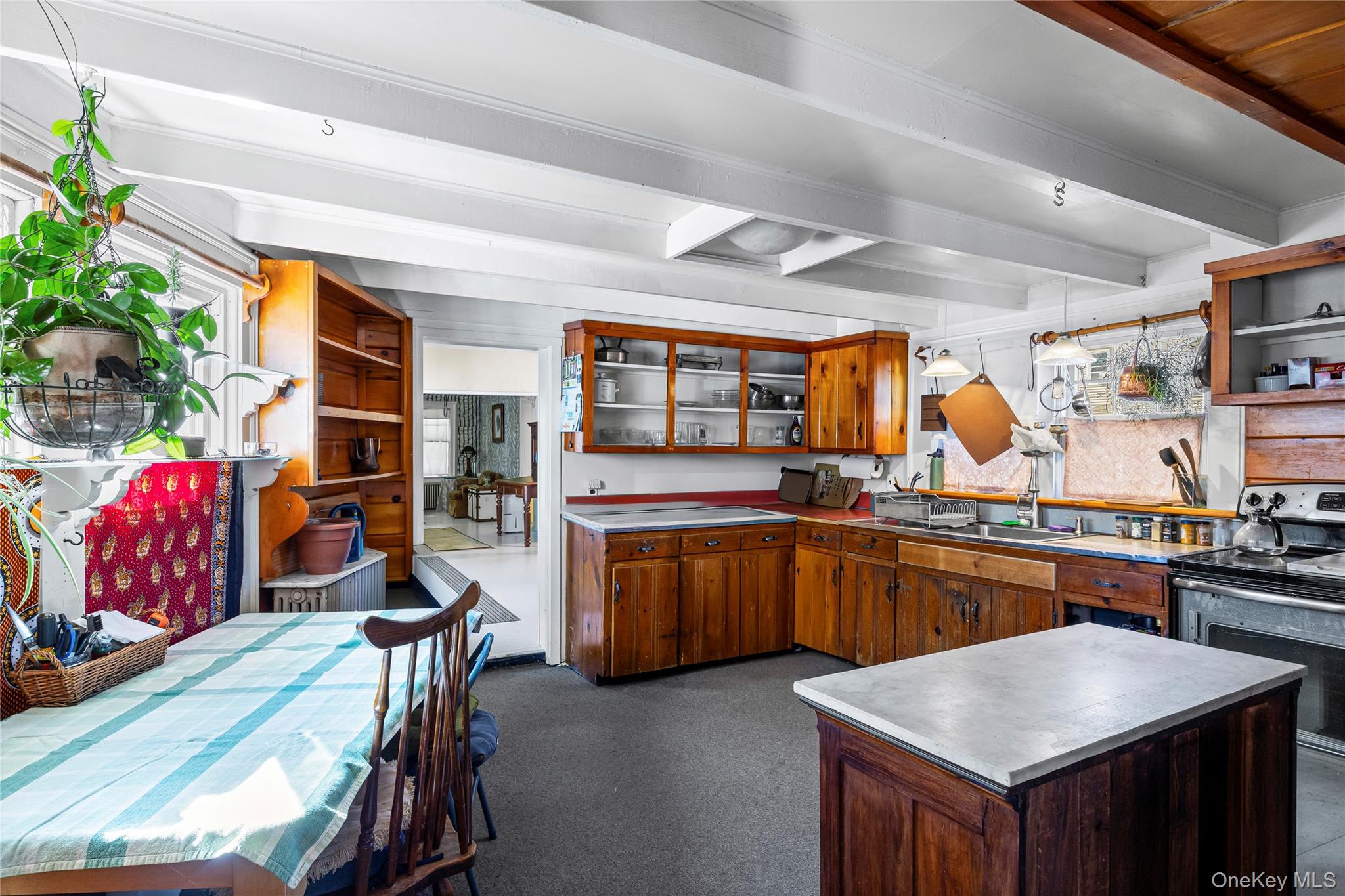 403 Middle Road Bayport, NY 11705 - Photo 21 of 48 a kitchen with stainless steel appliances granite countertop sink stove top oven and cabinets