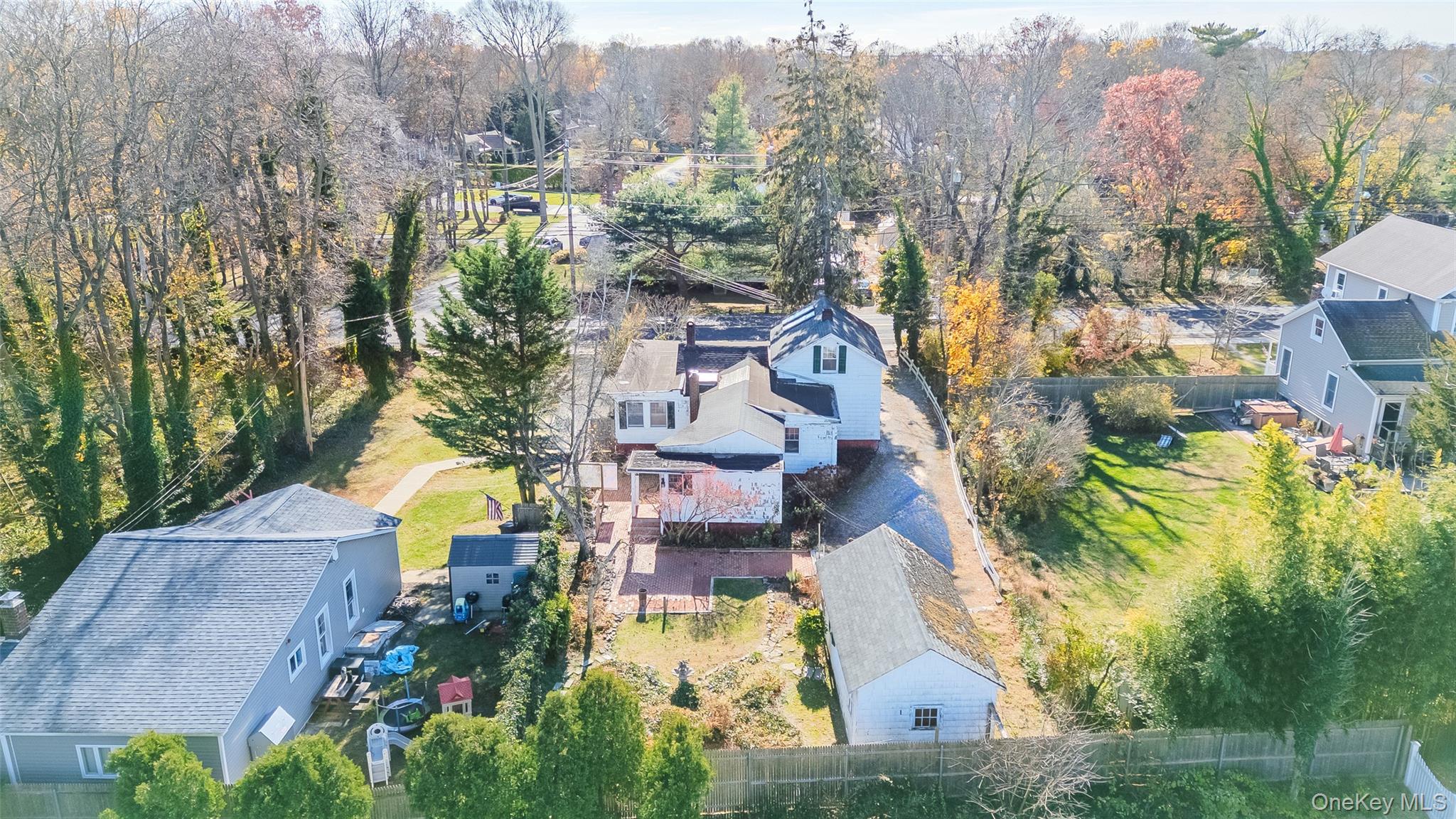 403 Middle Road Bayport, NY 11705 - Photo 40 of 48 an aerial view of residential houses with outdoor space and trees