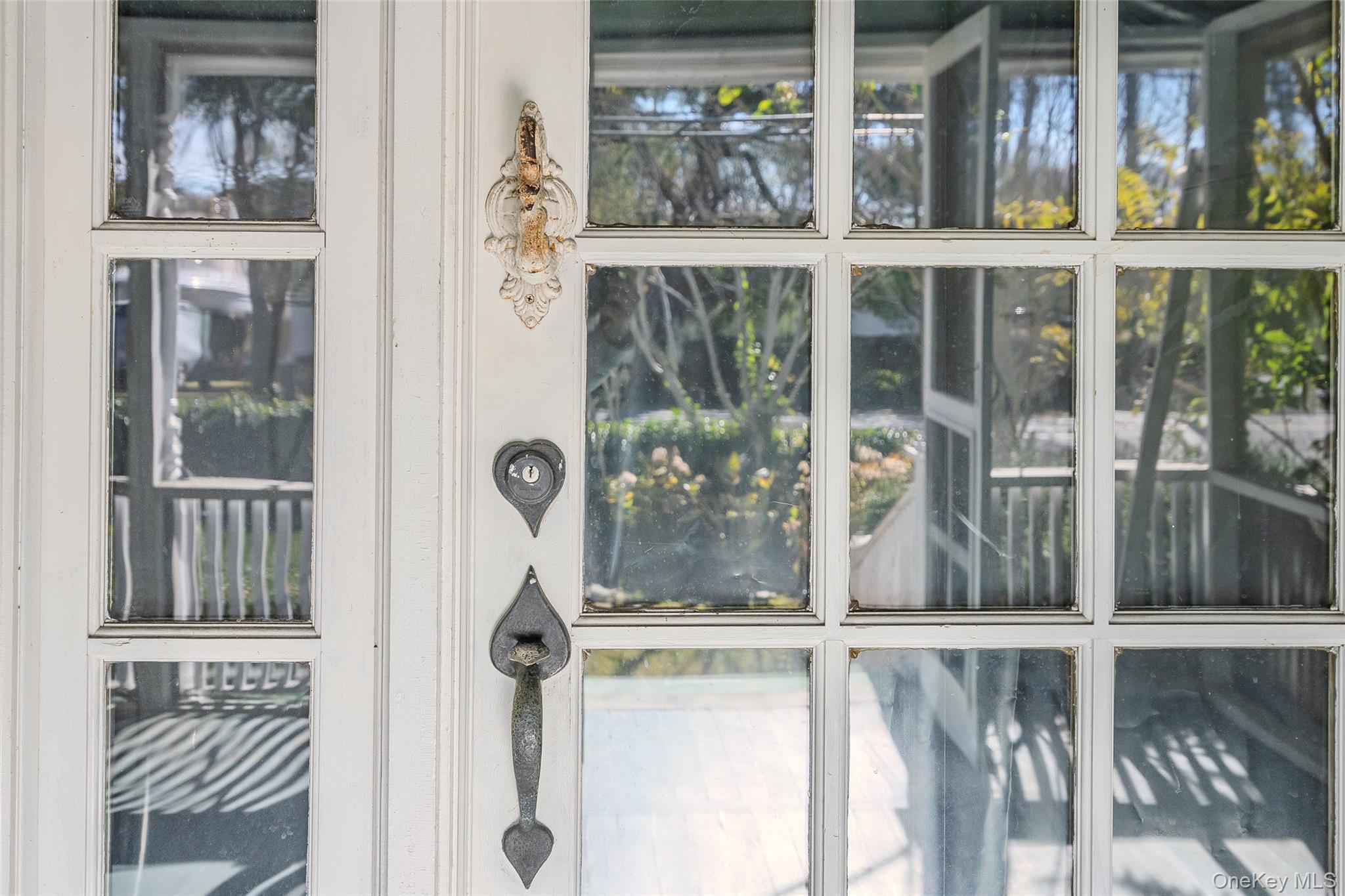 403 Middle Road Bayport, NY 11705 - Photo 8 of 48 a view of a door front of a house