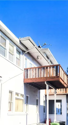 a spacious bathroom with a tub and a sink