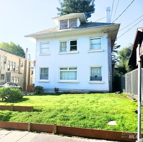 a front view of house with yard