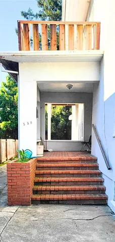 a house view with a outdoor space