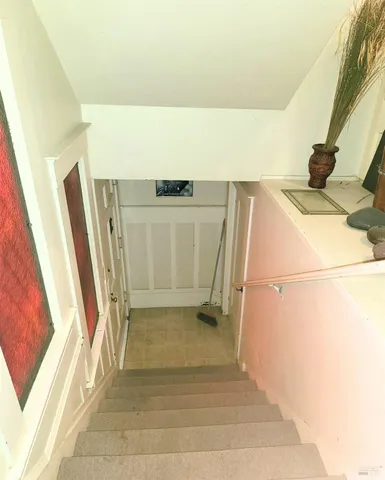 a view of empty room with windows