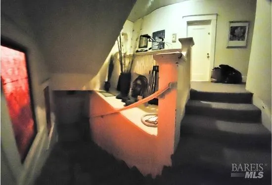 a view of a balcony with wooden floor