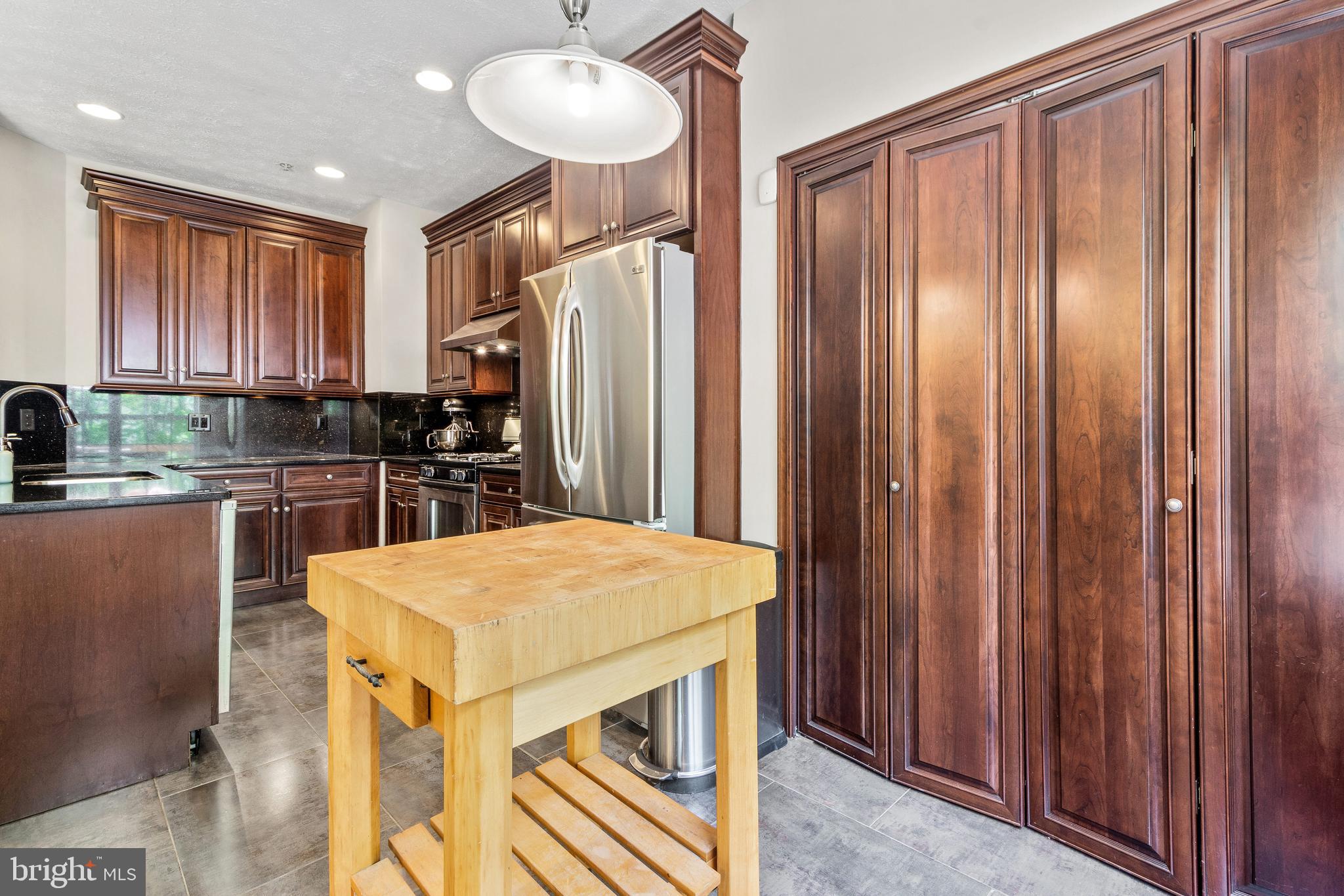 1258 Breckenridge Circle Riva, MD 21140 - Photo 11 of 36 Cherry cabinetry and pantry doors