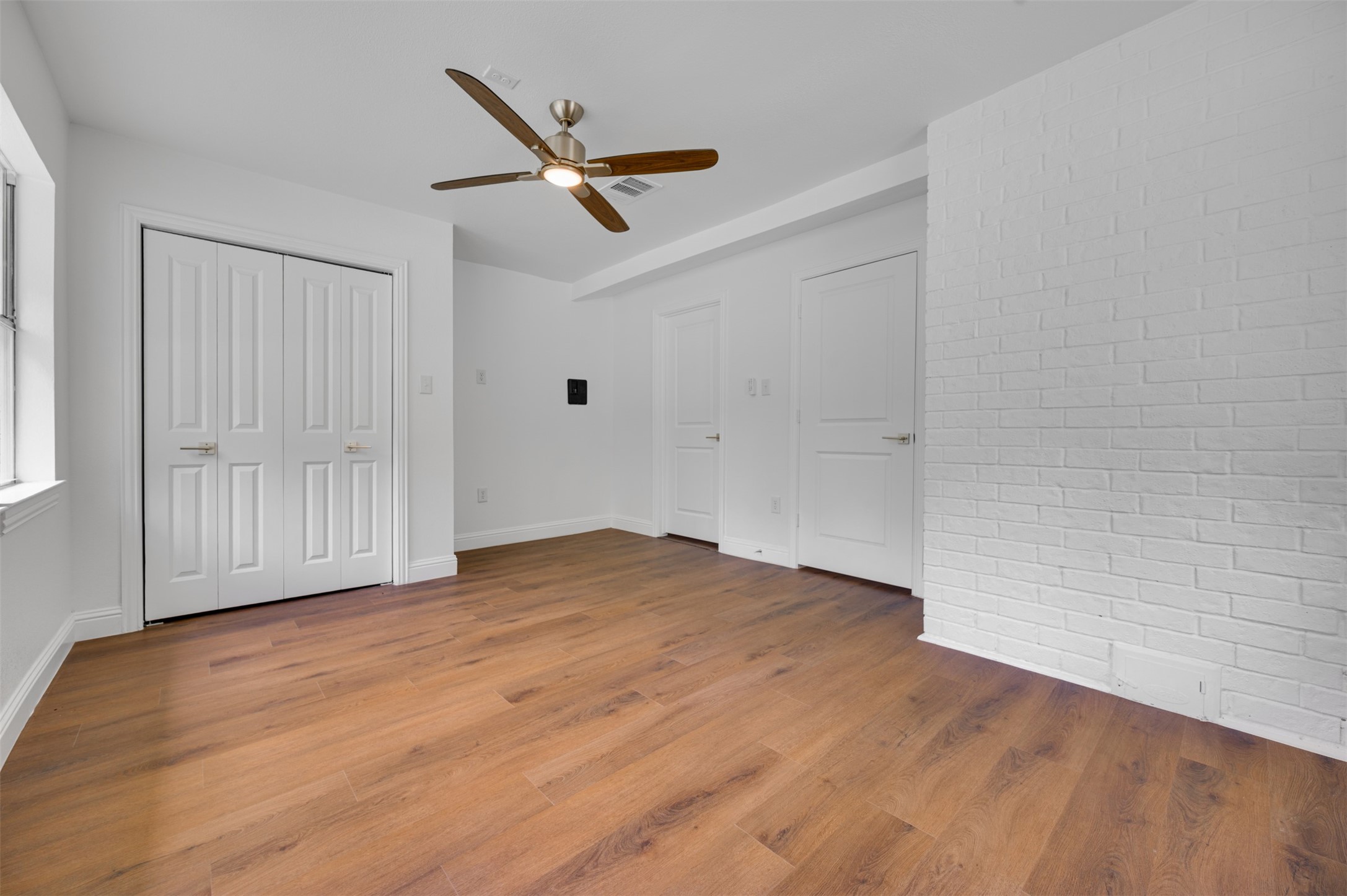 302 An County Road 3914 Palestine, TX 75801 - Photo 19 of 44 wooden floor in an empty room