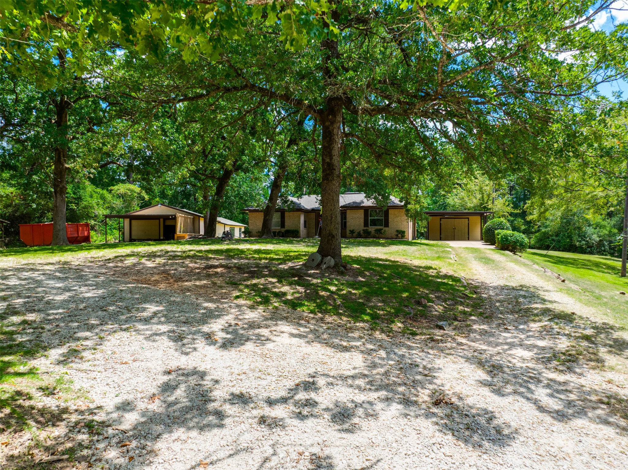 302 An County Road 3914 Palestine, TX 75801 - Photo 2 of 44 a view of a house with a yard
