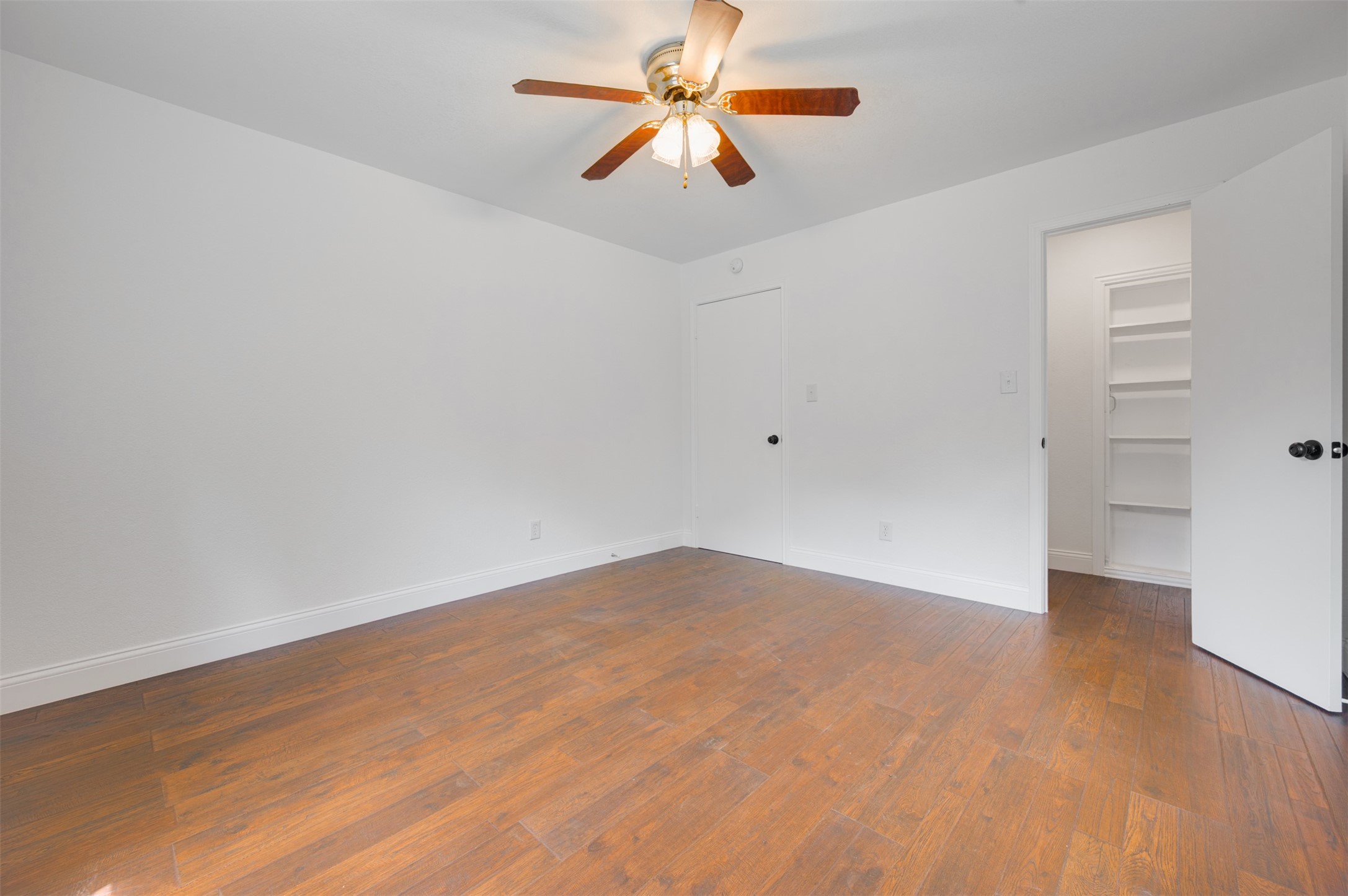 302 An County Road 3914 Palestine, TX 75801 - Photo 34 of 44 wooden floor in an empty room