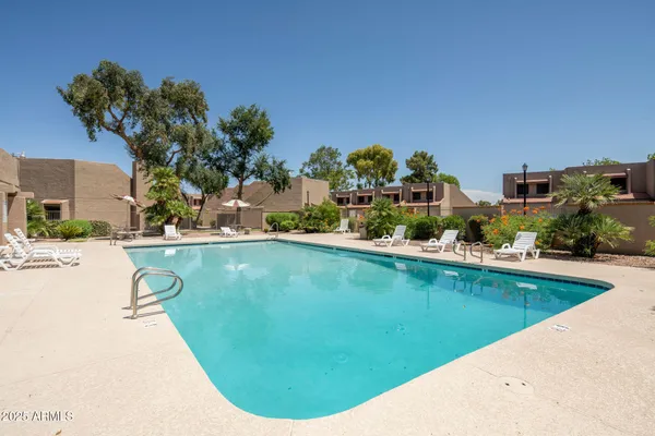a view of a house with swimming pool