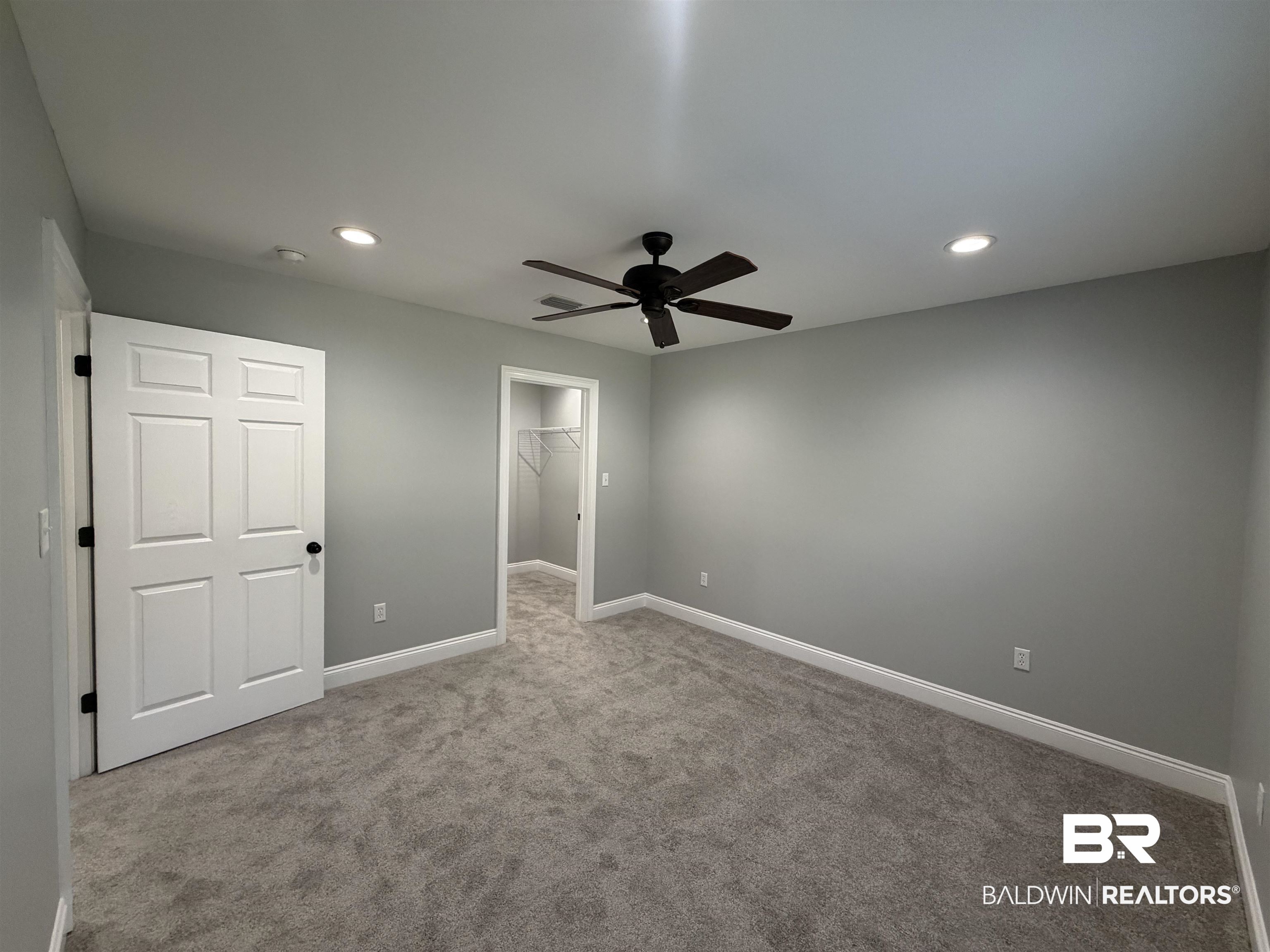 2454 Taylor Avenue Mobile, AL 36606 - Photo 17 of 24 Unfurnished bedroom featuring recessed lighting, a spacious closet, carpet floors, and a ceiling fan