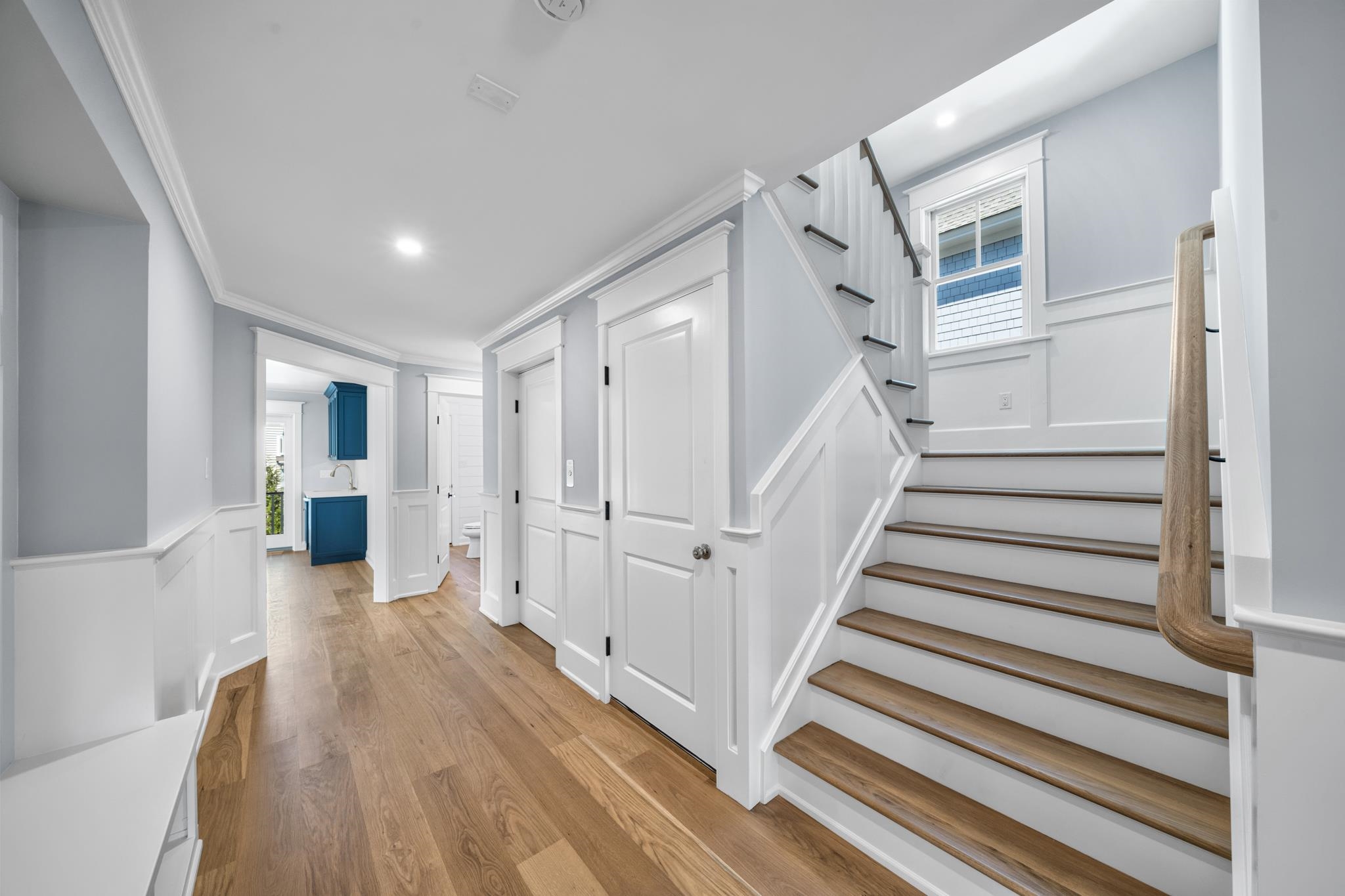 65 East 24th Avalon, NJ 08202 - Photo 14 of 49 a view of a hallway with wooden floor and stairs