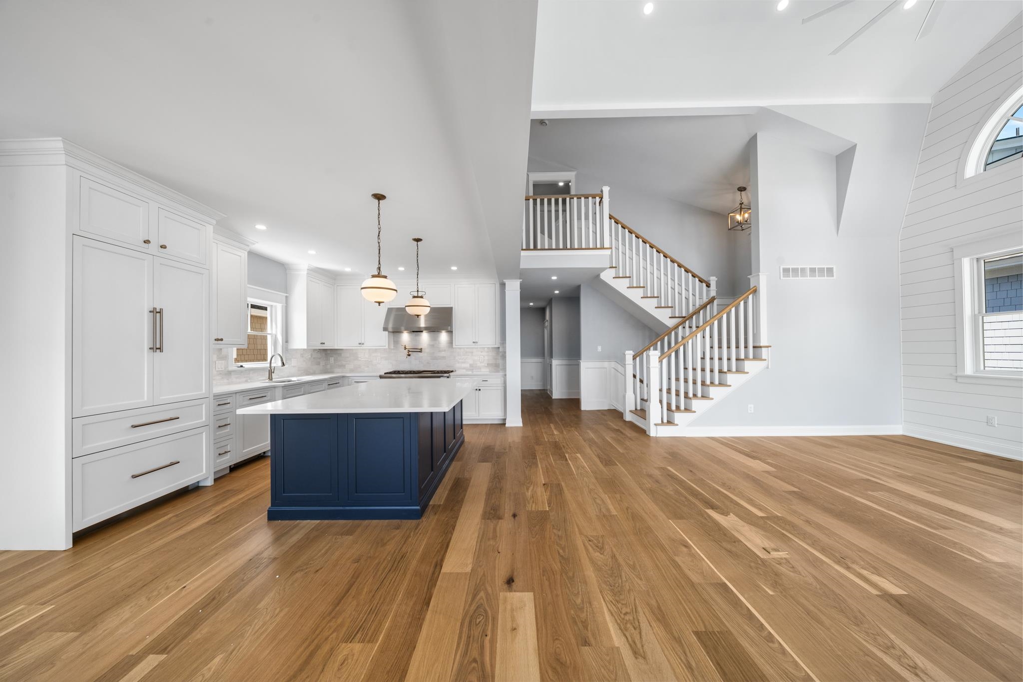 65 East 24th Avalon, NJ 08202 - Photo 15 of 49 a view of kitchen and hall with wooden floor