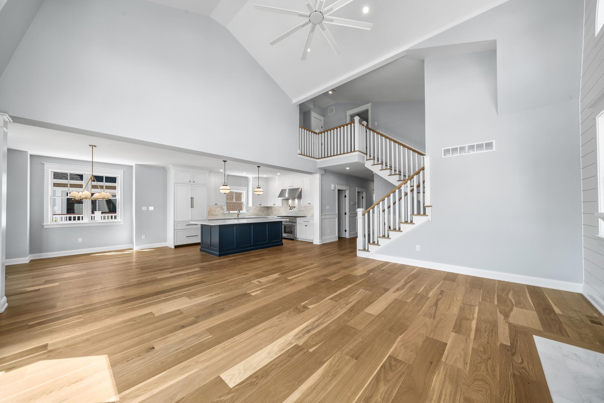 65 East 24th Avalon, NJ 08202 - Photo 16 of 49 a view of empty room with wooden floor and fan