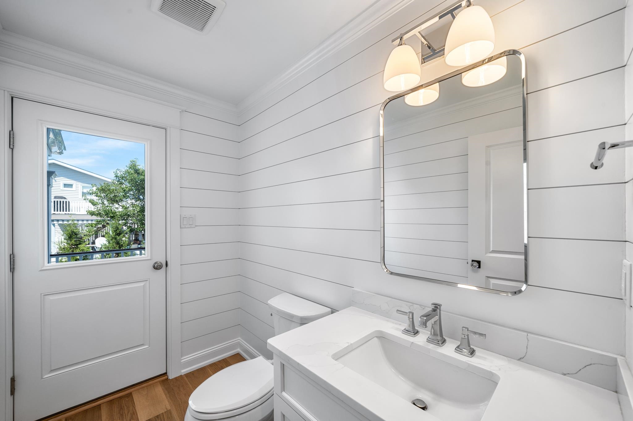 65 East 24th Avalon, NJ 08202 - Photo 33 of 49 a bathroom with a sink toilet and shower
