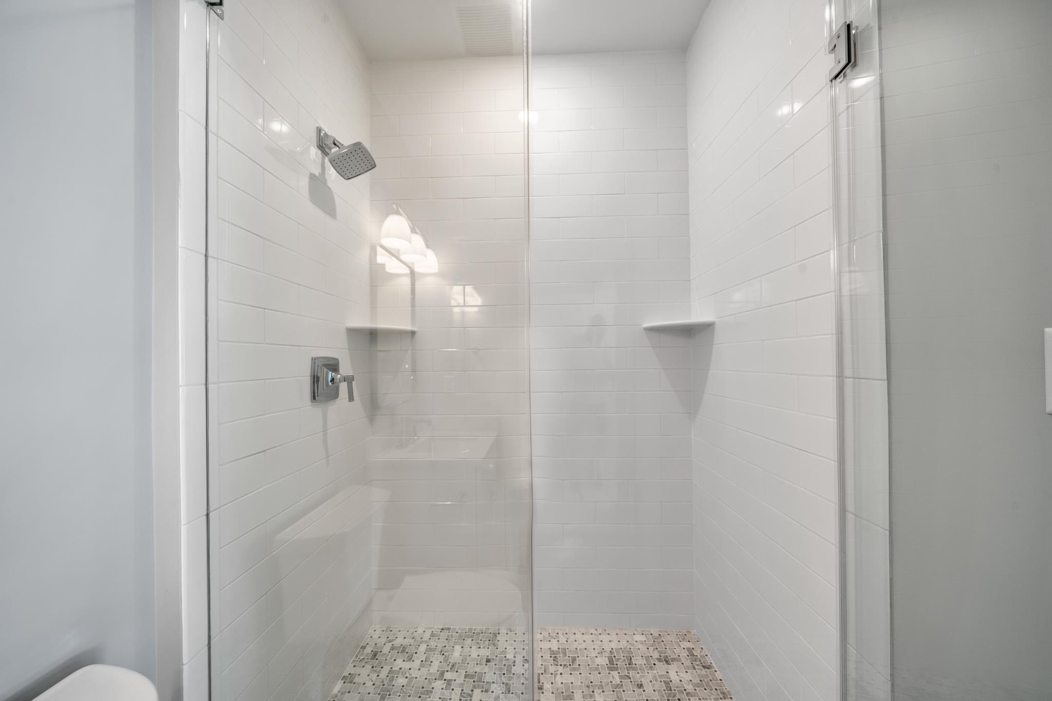 65 East 24th Avalon, NJ 08202 - Photo 41 of 49 a bathroom with a shower