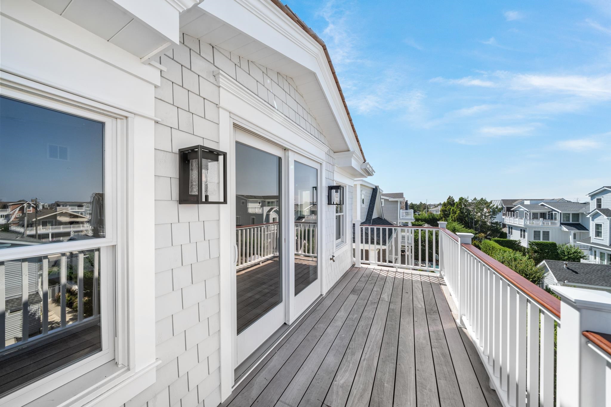 65 East 24th Avalon, NJ 08202 - Photo 45 of 49 a view of a balcony with wooden floor