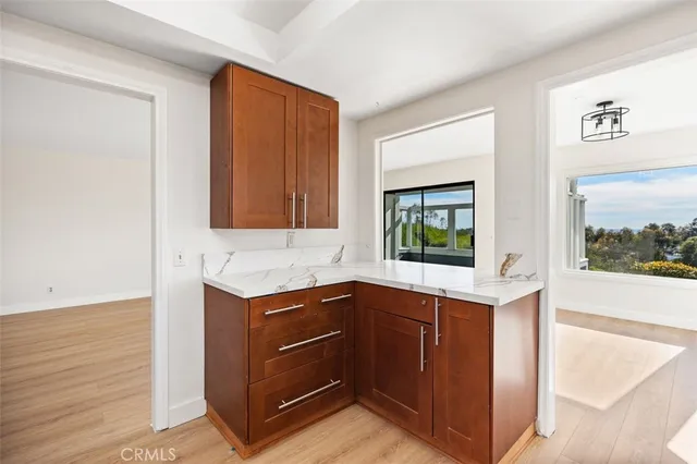 a kitchen with a sink and a window